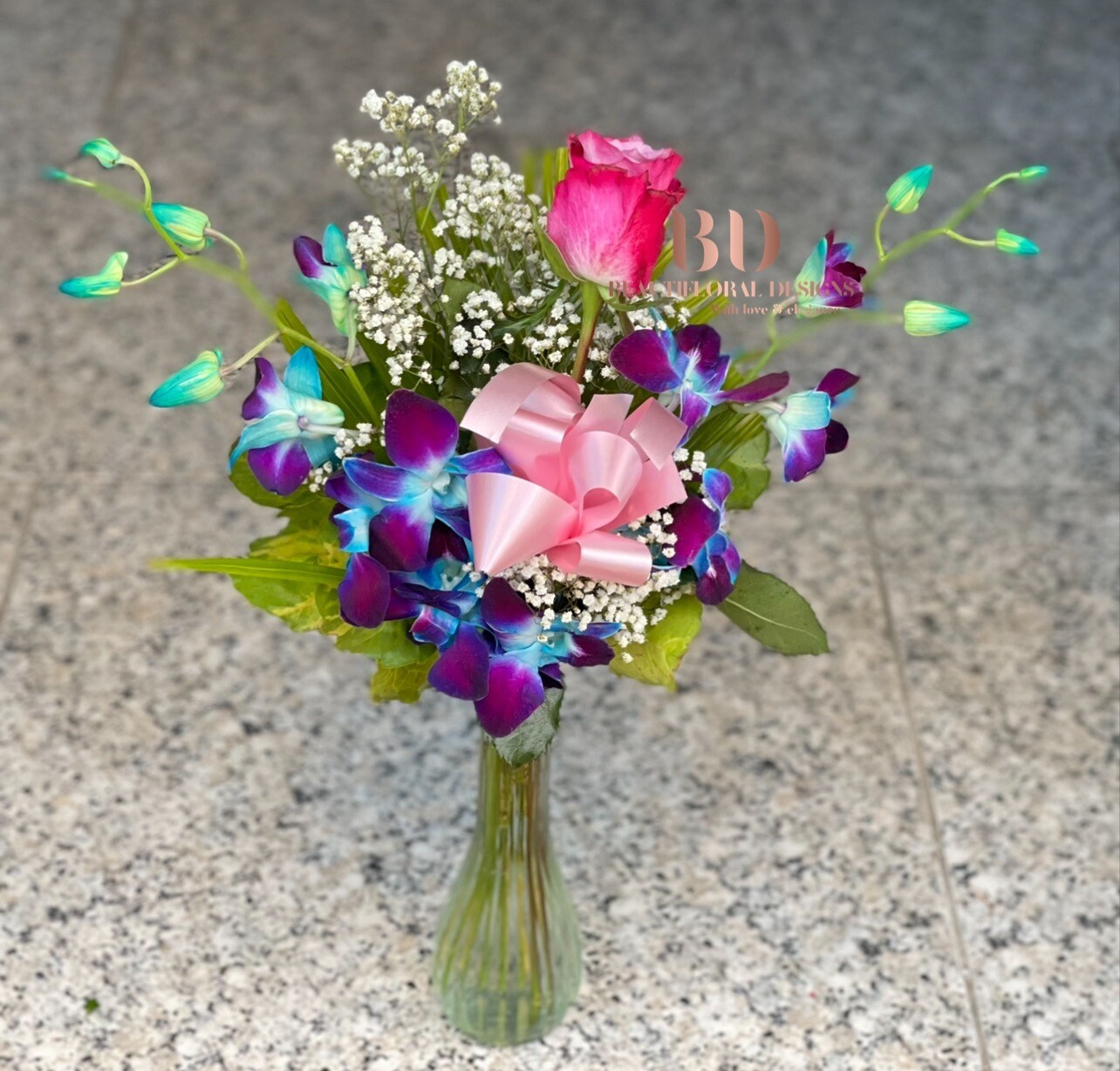 2 orchids &amp; 1 rose in a vase