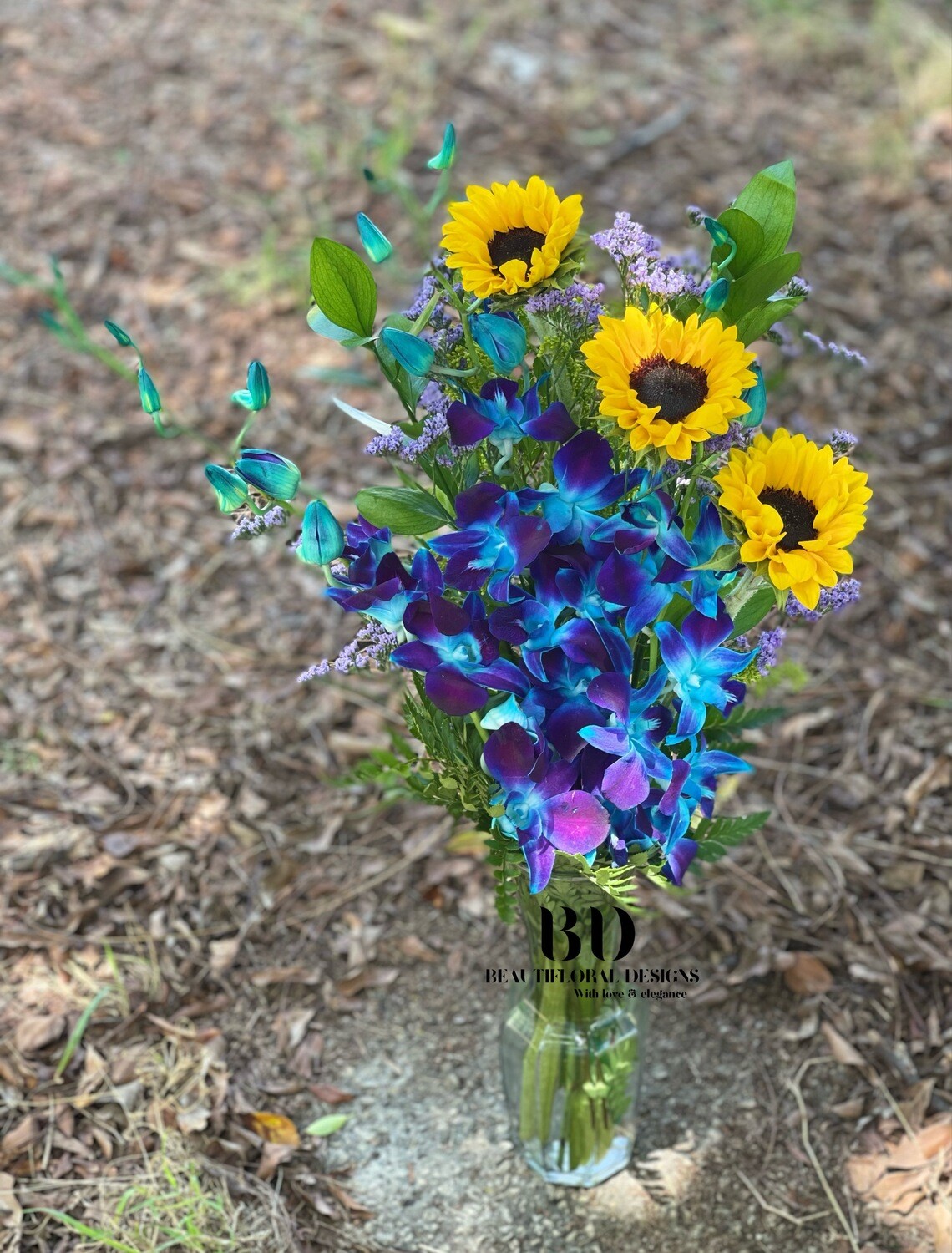 Orchids &amp; sunflowers arrangement