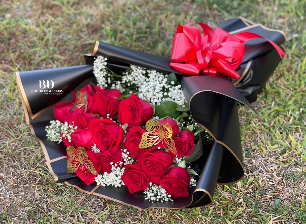 18 premium rose bouquet adorned w/ butterflies