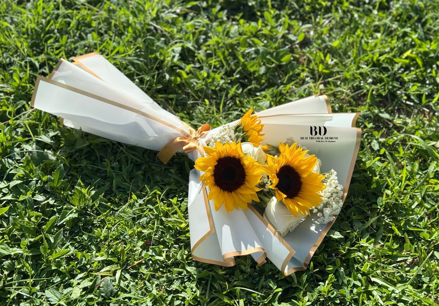 Sunflowers &amp; roses in white lux wrap