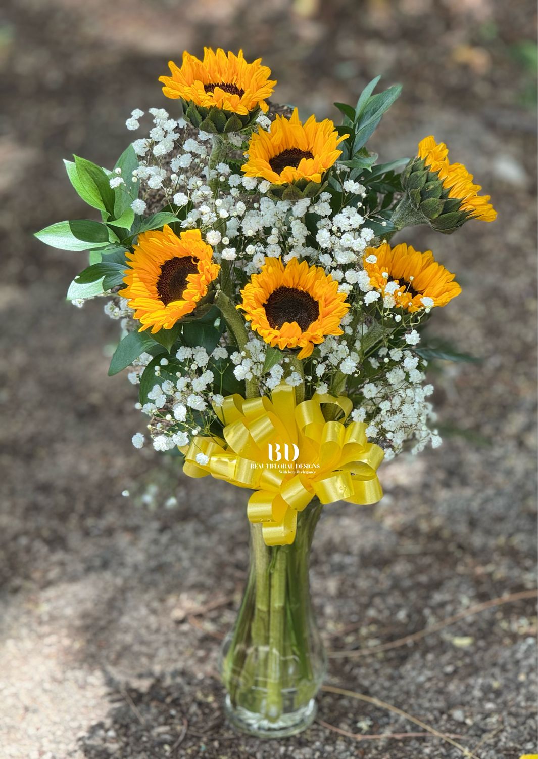 6 sunflowers in a vase
