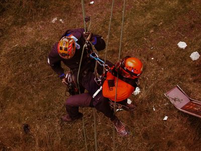 Rope access technicians practising rescue techniques during IRATA training at Dangle Academy Belfast