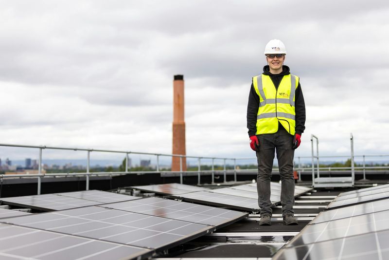 Telecoms workers accessing rooftop structure during EUSR Rooftop Worker Safety training in Belfast