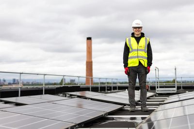 Telecoms workers accessing rooftop structure during EUSR Rooftop Worker Safety training in Belfast