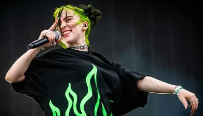 🌱 BILLIE EILISH: REVOLUTIONIZING THE MUSIC INDUSTRY THROUGH SUSTAINABILITY 🎤