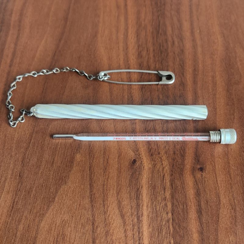 E. Kessling “Firstaid” Oral Fever Thermometer – Aluminum Safety Case with Chain & Pin E. Kessling “Firstaid” Oral Fever Thermometer – Aluminum Safety Case with Chain & Pin