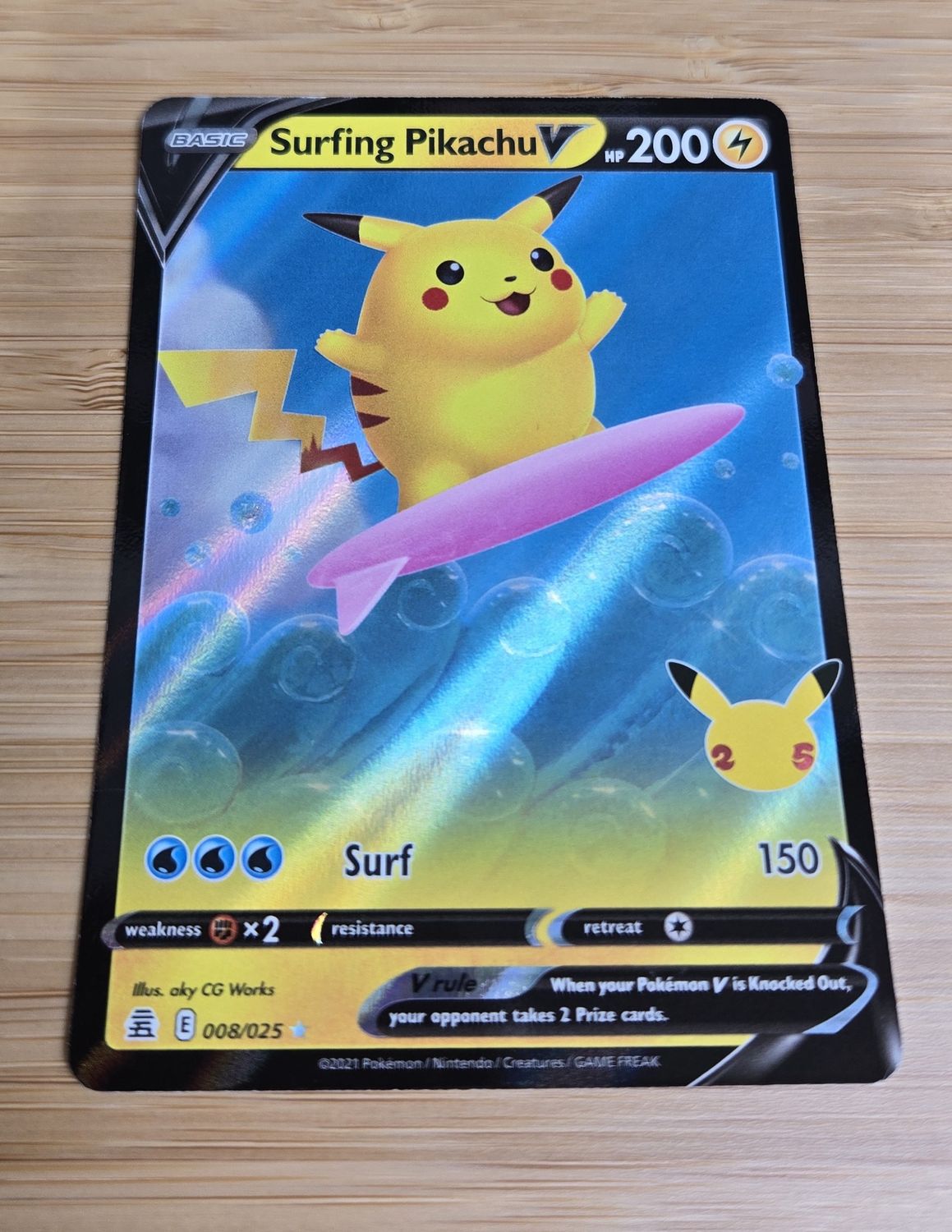 Surfing Pikachu V - 008/025 - Celebrations - NM