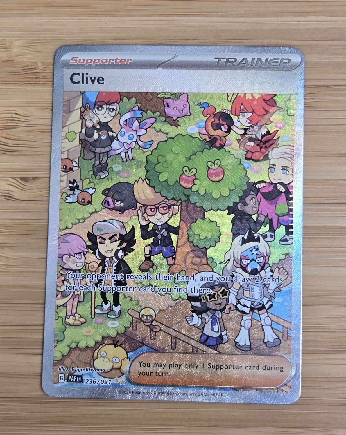 Clive Trainer - 236/091 - Paldean Fates - NM, Model: A