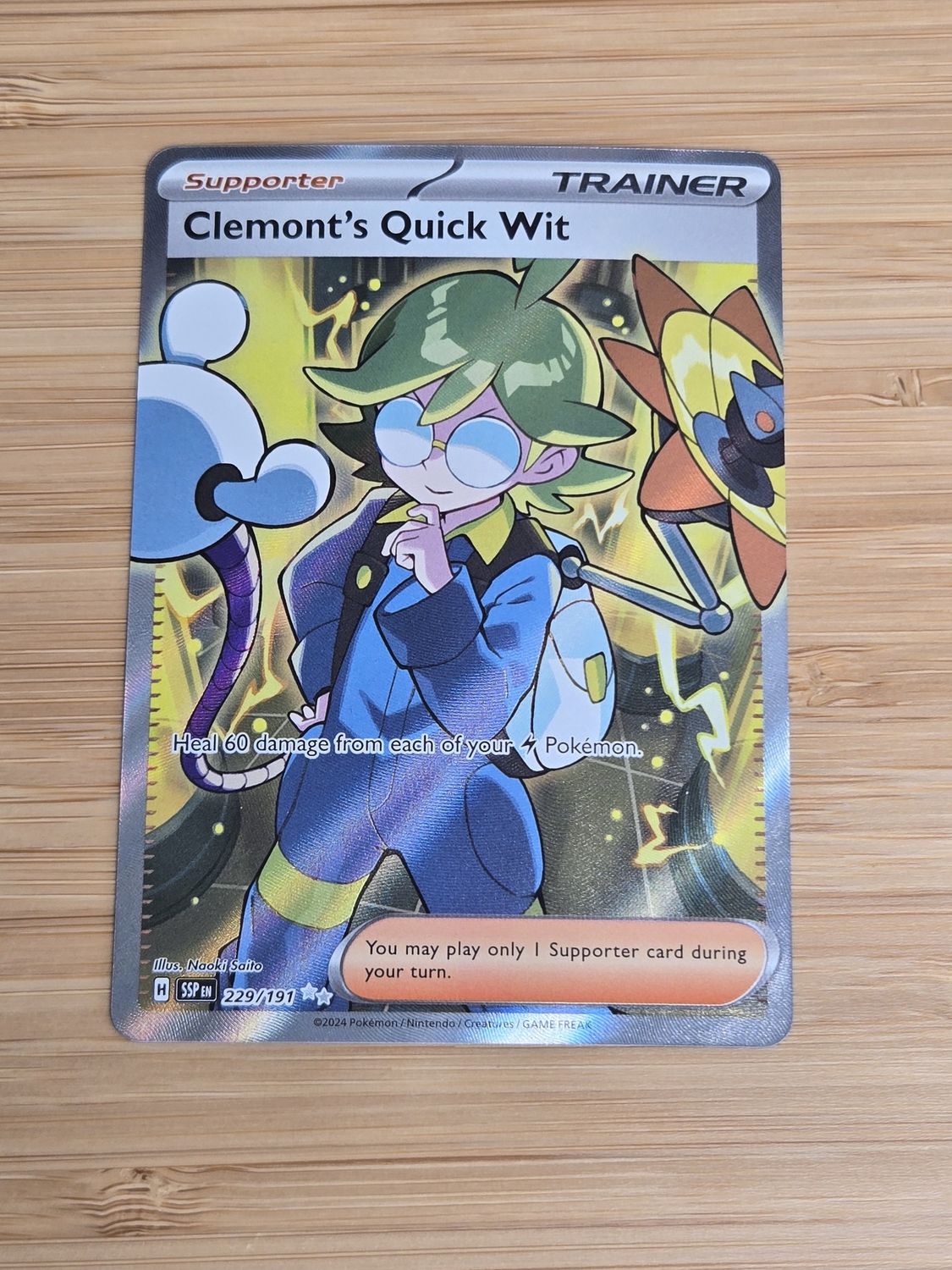 Clemont's Quick Wit - 229/191 - Surging Sparks - NM Clemont's Quick Wit - 229/191 - Surging Sparks - NM