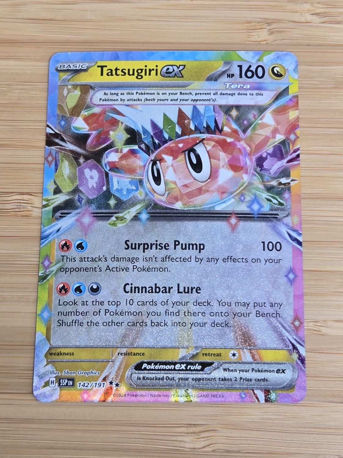 Tatsugiri ex - 142/191 - Surging Sparks - NM