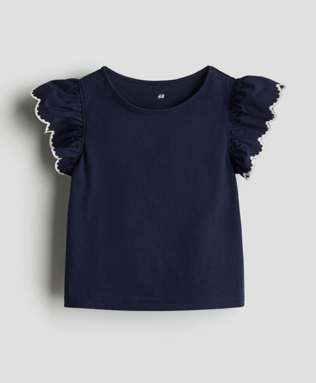 Jersey top with eyelet Embroidery 