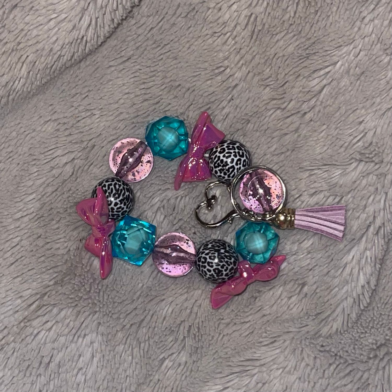 Wristlet With Fuchsia, Bose, Purple, Teal, And Leopard Print Acrylic Beads