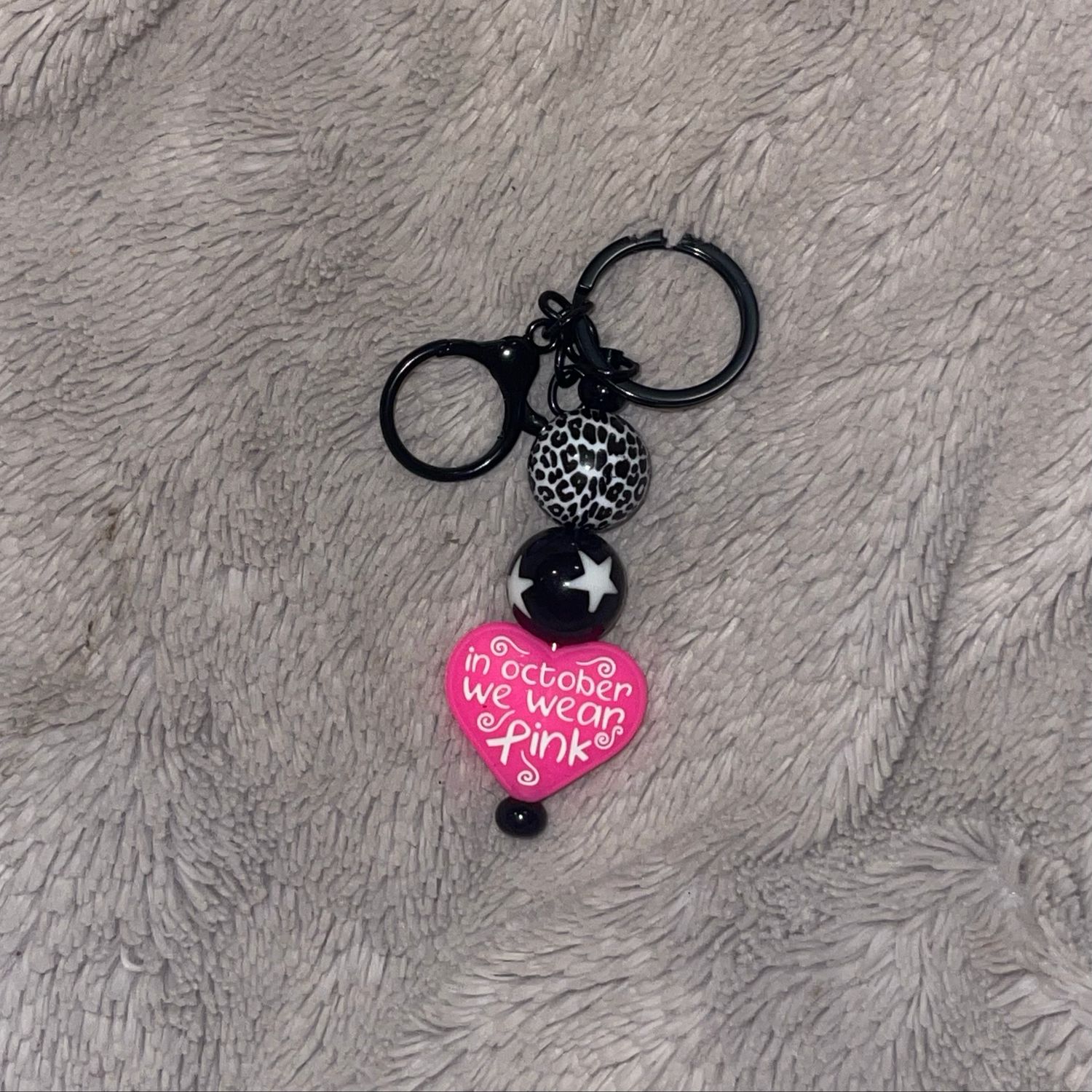 In October, We Wear Pink Black And White Star Cheetah Print Beaded Bar Bar Keychain