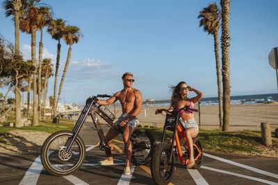 Electric fat bike tour along Huntington Beach boardwalk at sunset
