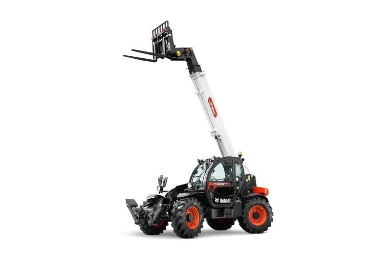 Engin compact de levage à bras télescopique avec fourche
