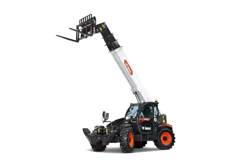 Engin compact de levage à bras télescopique avec fourche