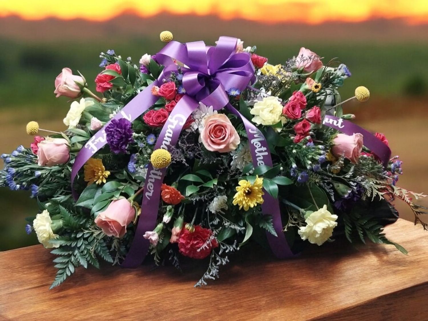 Colorful casket spray CALL TO ORDER