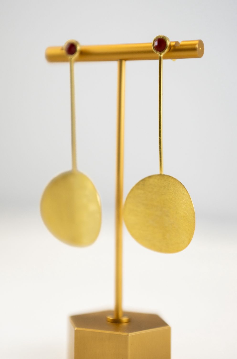 Gold Curved Coin w/Red Stone