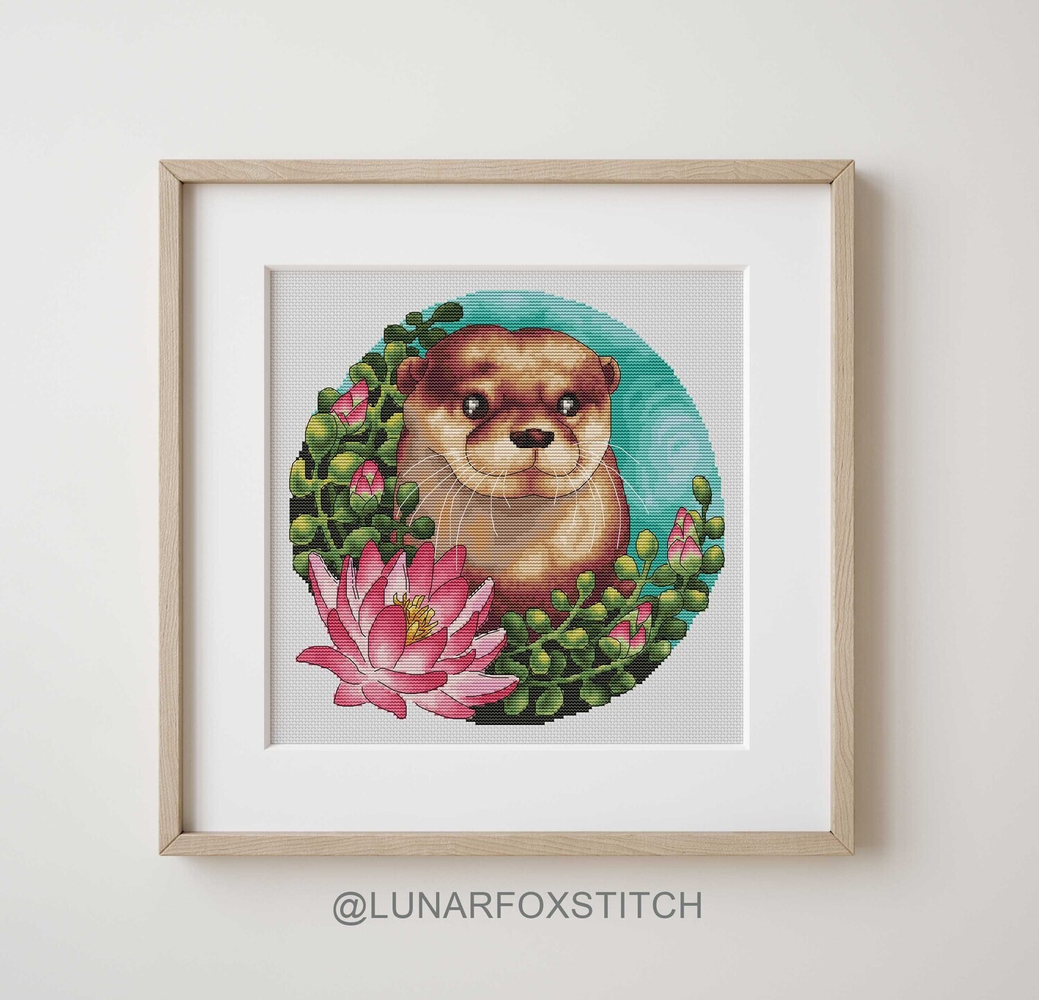 Lotus blossom otter cross stitch pattern