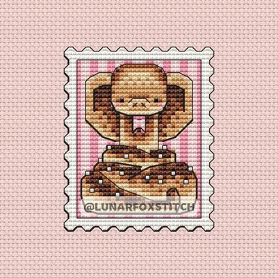 Cinnamon roll snake postage stamp cross stitch pattern