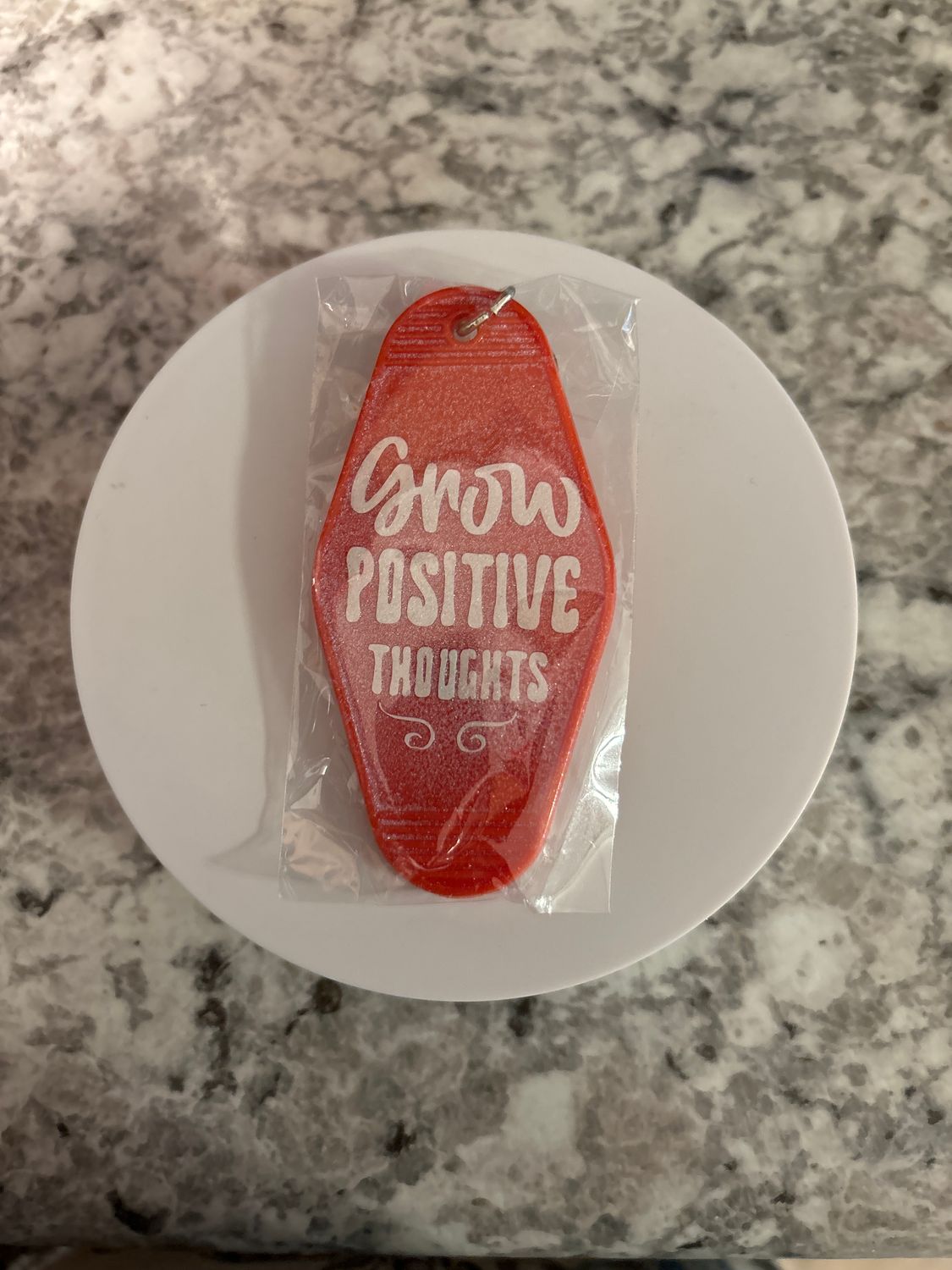 Red motel keychain Grow Positive Thoughts