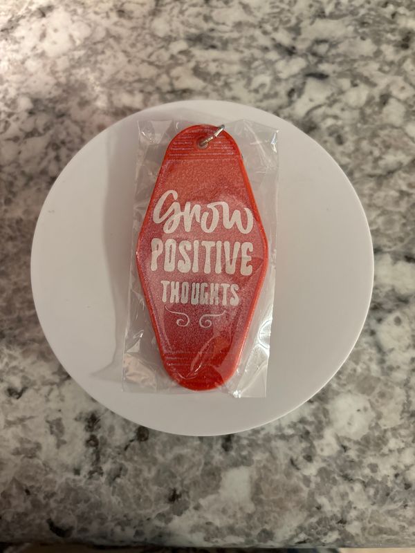 Red motel keychain Grow Positive Thoughts