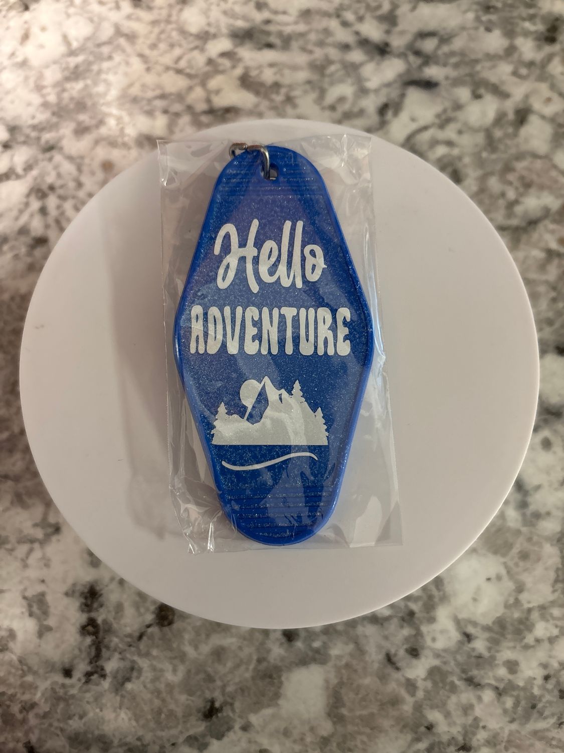 Blue motel keychain Hello Adventure