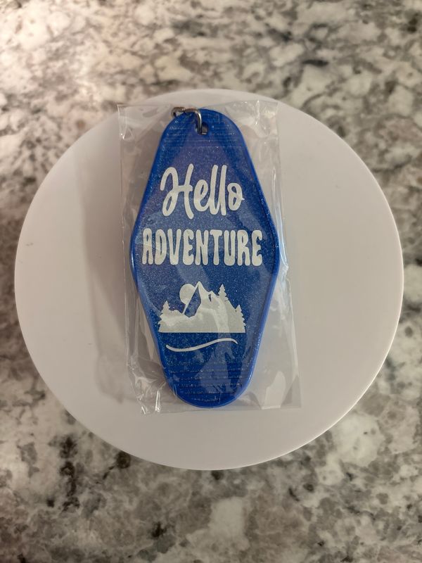 Blue motel keychain Hello Adventure