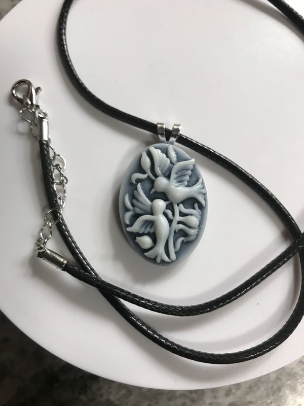 Resin bird pendant necklace