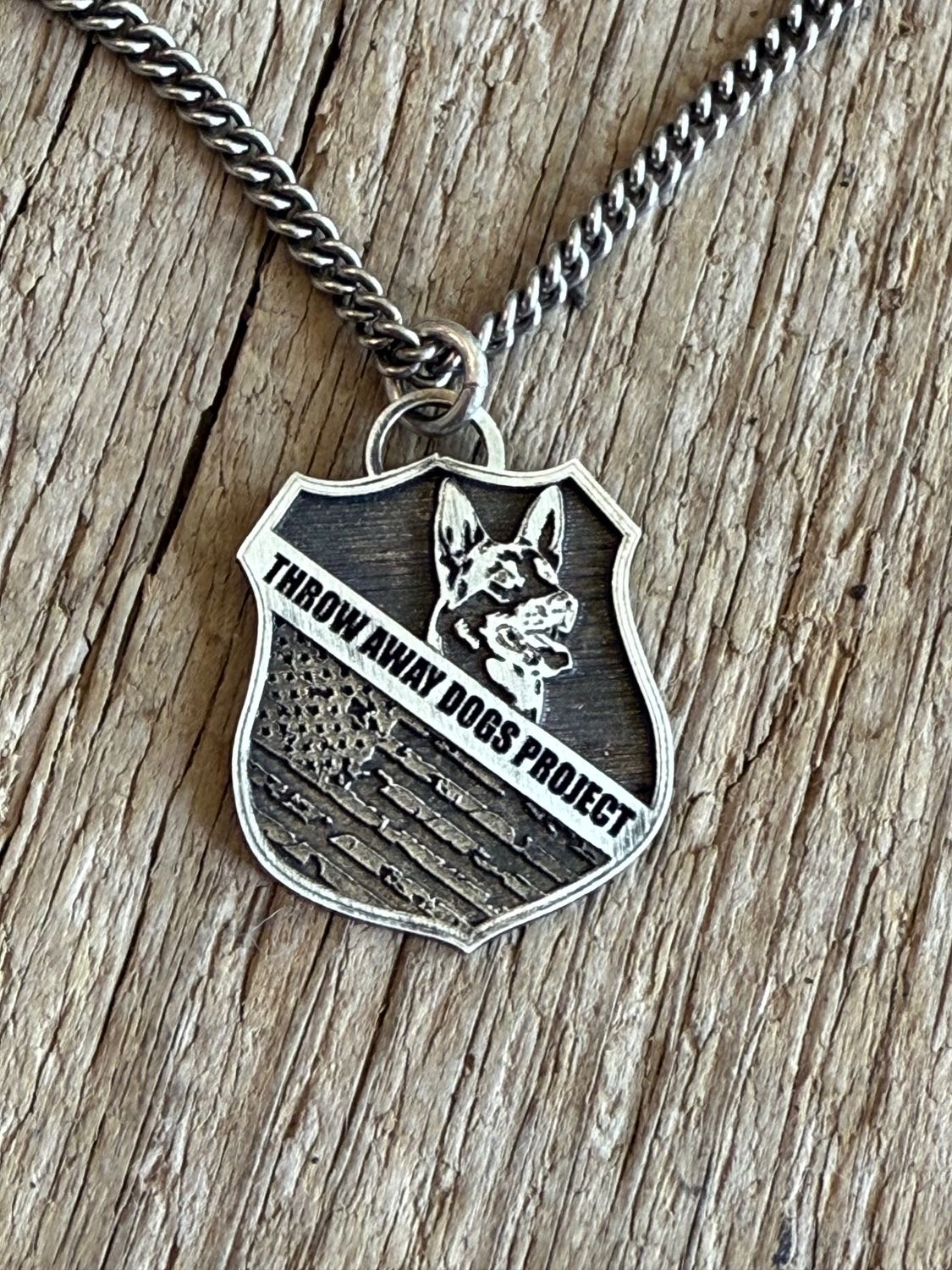 Throw Away Dogs Project™ Flag Badge in Sterling