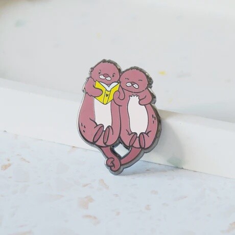 Sea Otters Reading Enamel Pin