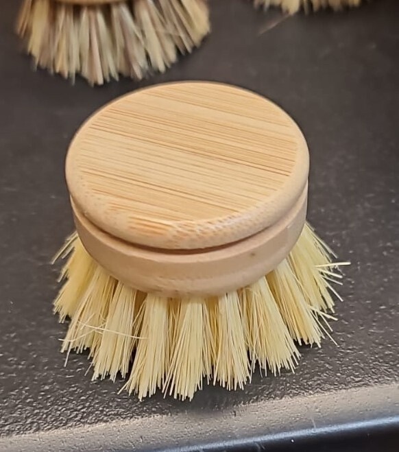 Replacement head for hand scrubber