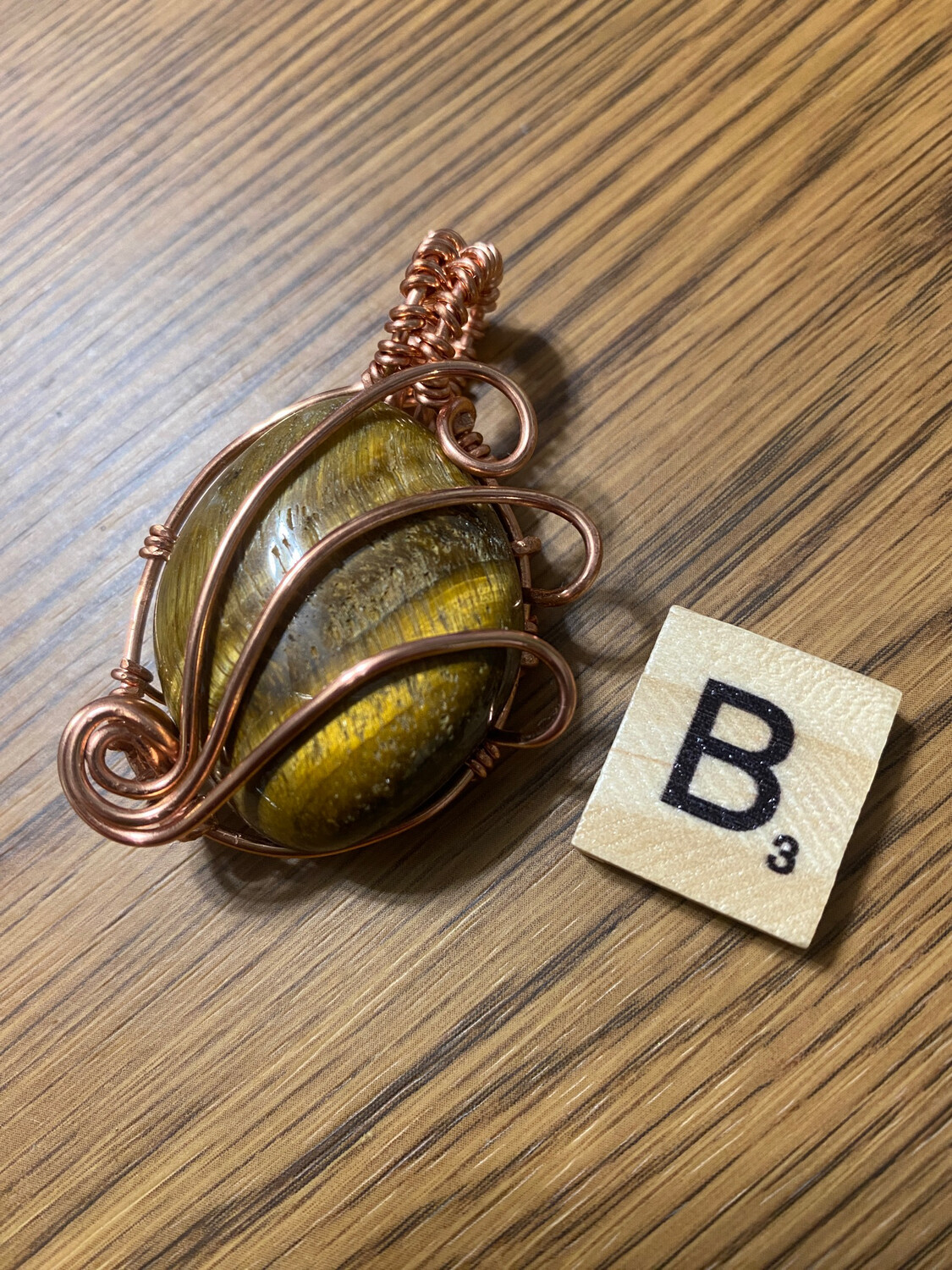 Tiger Eye Triple Swirl Pendant.