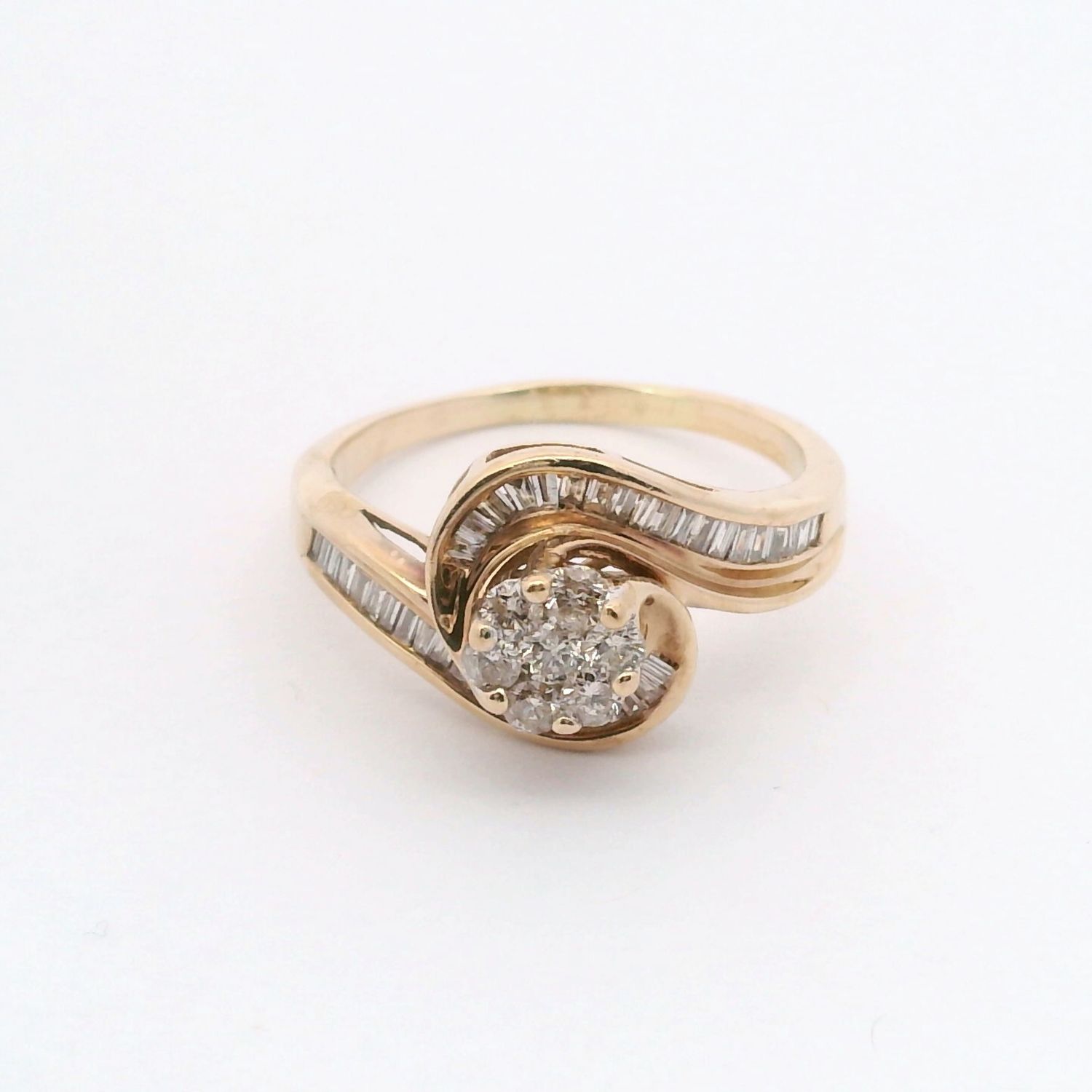 14KY Spiral Cluster w/ Baguette Accents Diamond Ring 14KY Spiral Cluster w/ Baguette Accents Diamond Ring