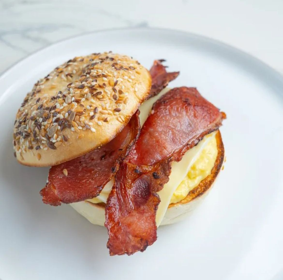 Bagel - Scrambled Egg, Pork or Beef Bacon &amp; Mozza