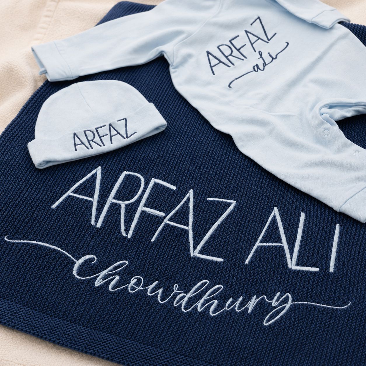 Personalized navy and powder-blue newborn set
