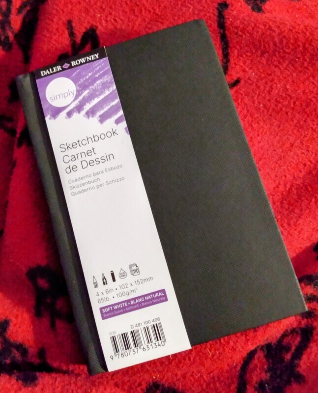 Black hardcover, heavy white page, journal