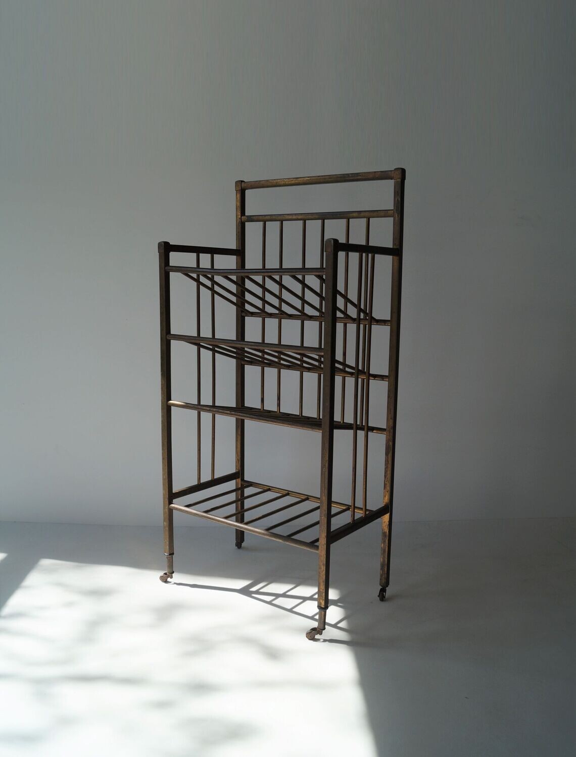 Art Deco brass and oak magazine stand by Ernst Rockhausen, 1920s