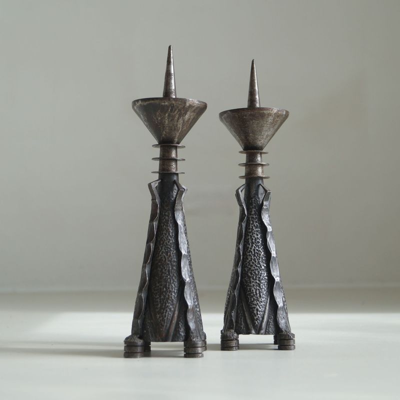 Amsterdam School Winkelman & van der Bijl candlesticks in forged metal, ca. 1925