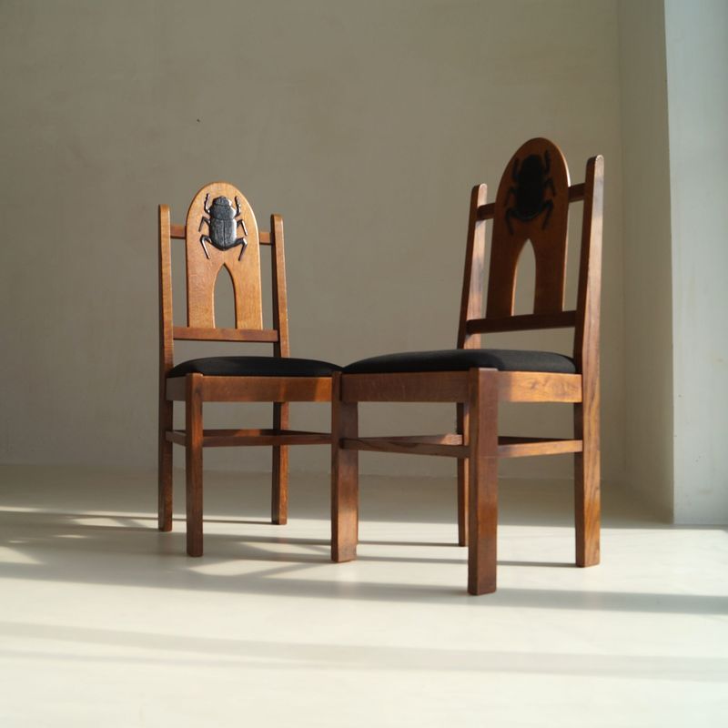 Pair of Amsterdam School Chairs with 'Egyptomania' Scarabs on backrest, c. 1925