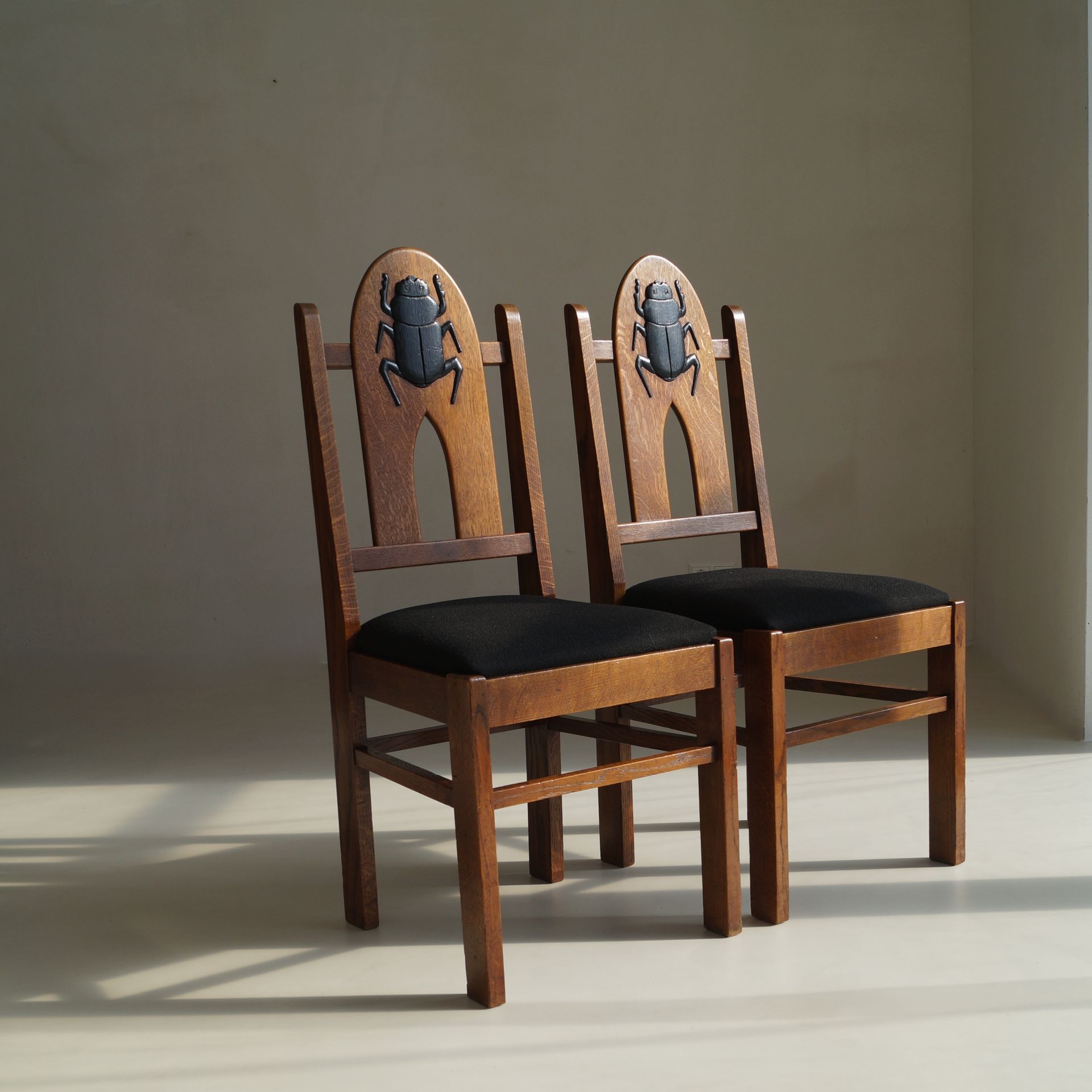 Pair of Amsterdam School Chairs with 'Egyptomania' Scarabs on backrest, c. 1925
