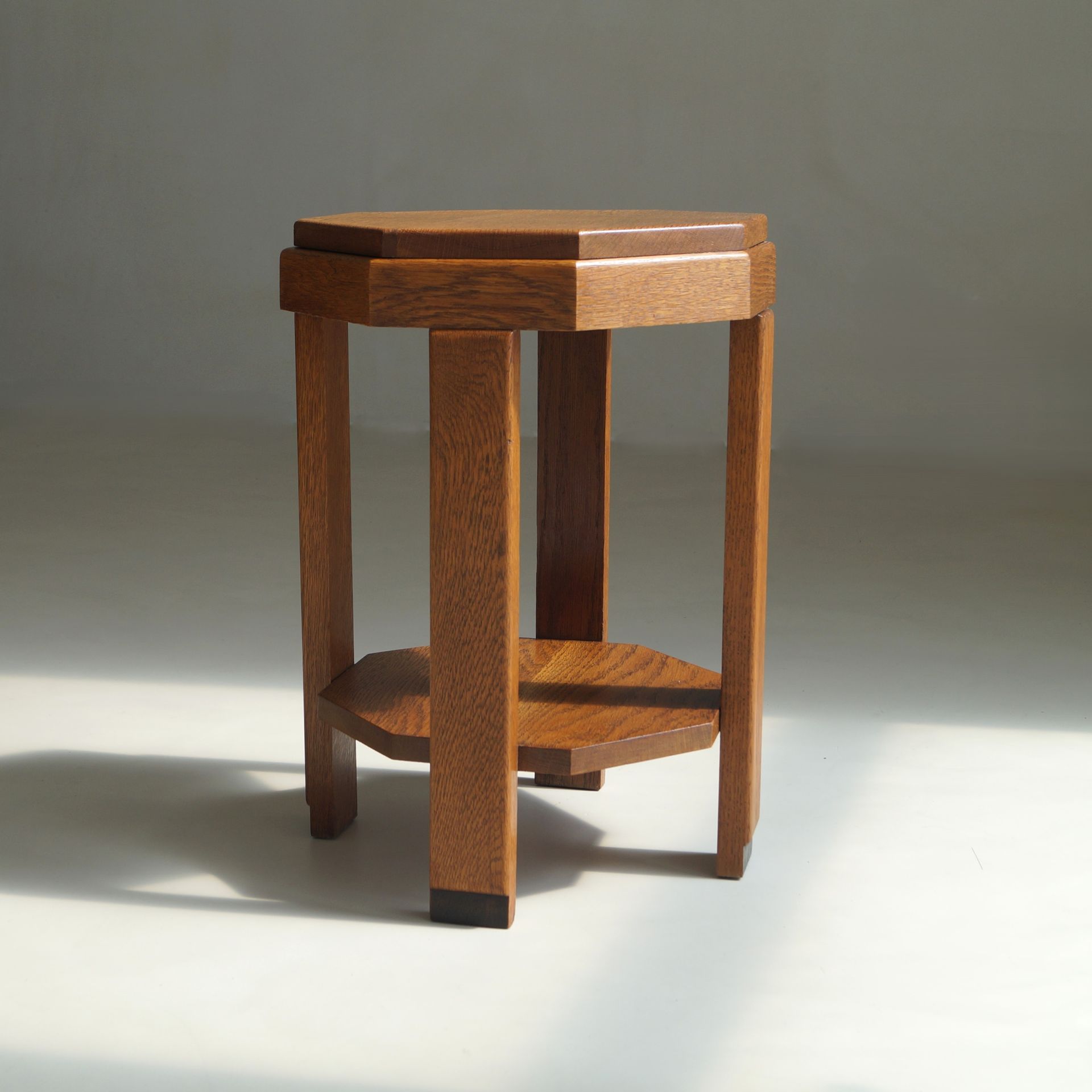 Dutch Art Deco solid oak accent table with octagonal tiers, 1920s