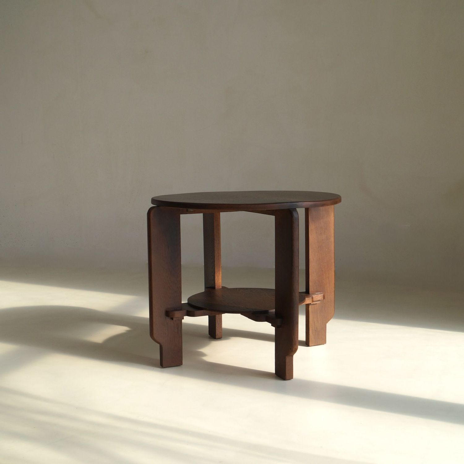Sculptural Dutch Art Deco centre table in dark stained oak, 1930s