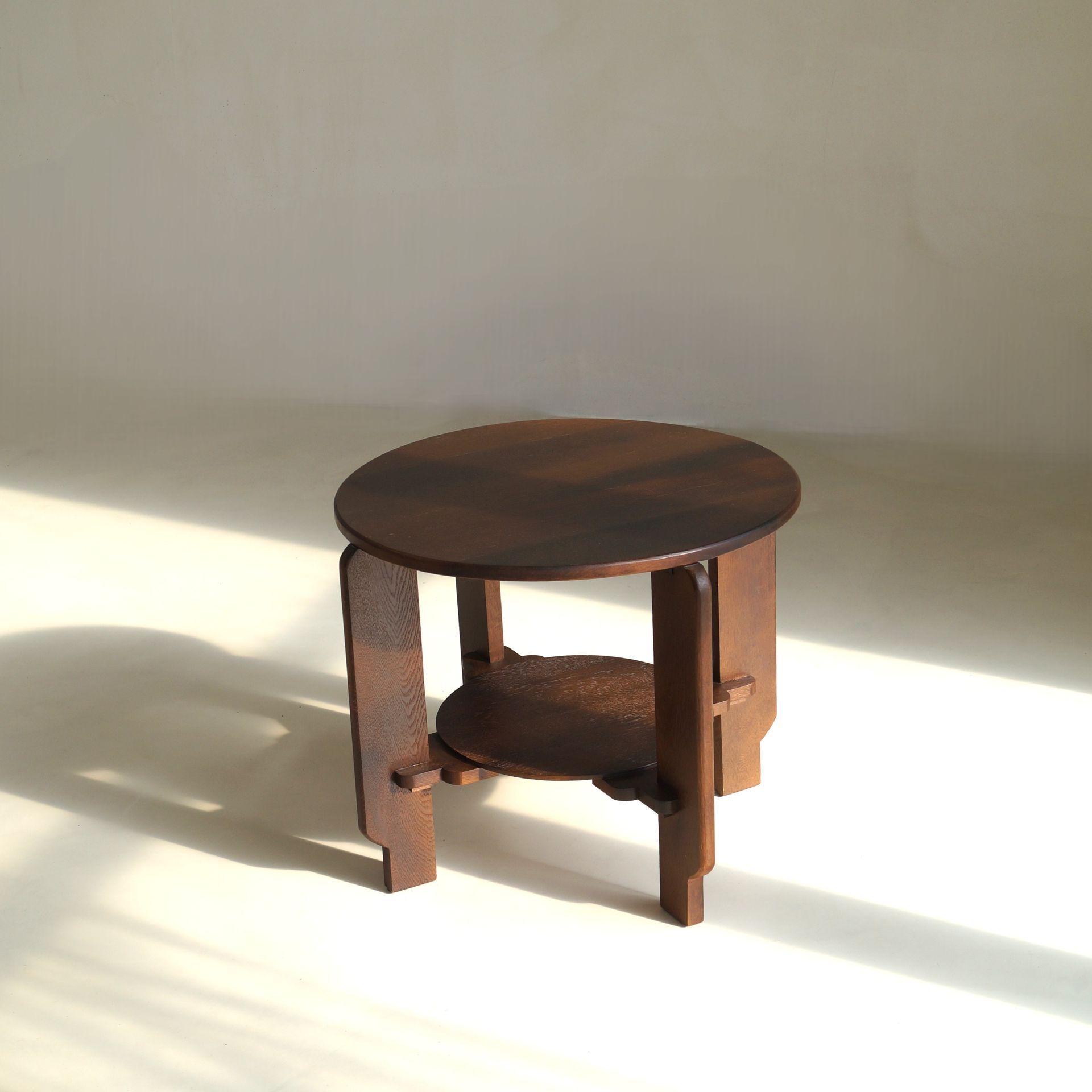 Sculptural Dutch Art Deco centre table in dark stained oak, 1930s