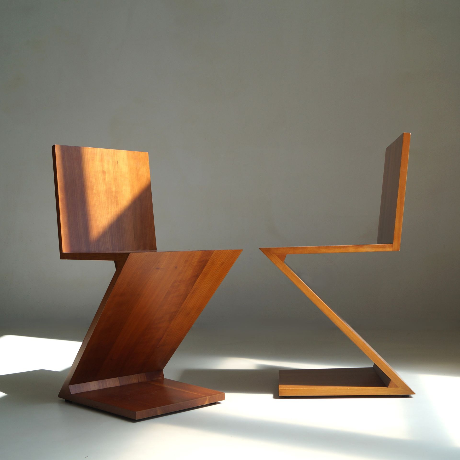 Pair of Zig Zag chairs, designed by Gerrit Rietveld, manufactured by Cassina, 1980s