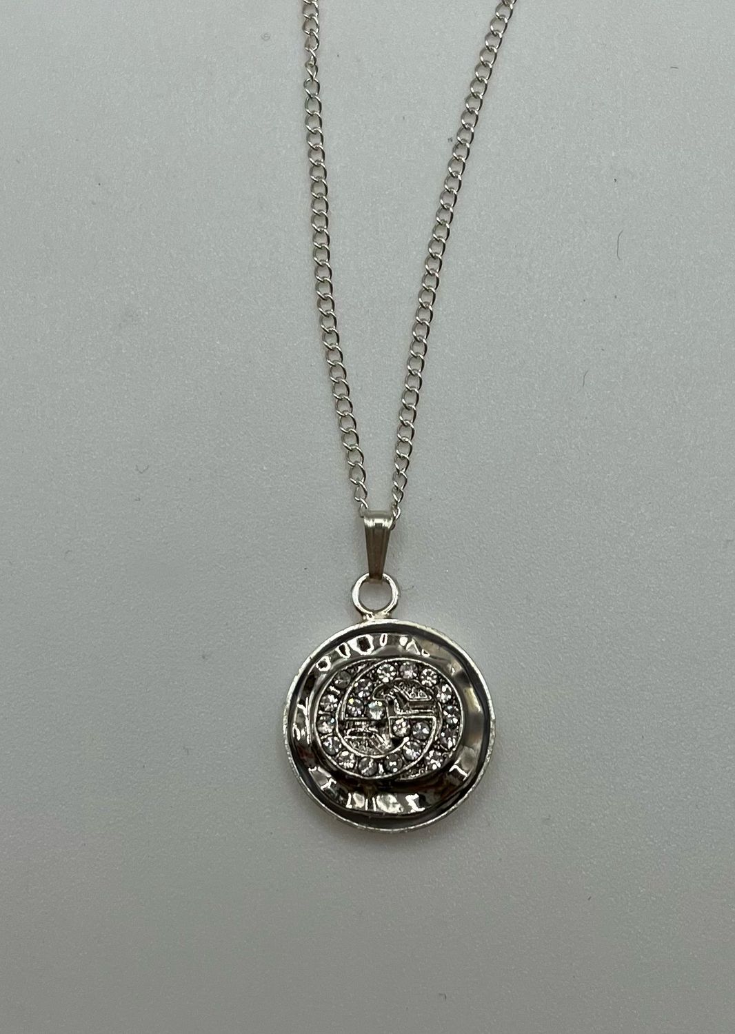 Designer’d Silver Crystal Gucci Button Pendant Necklace