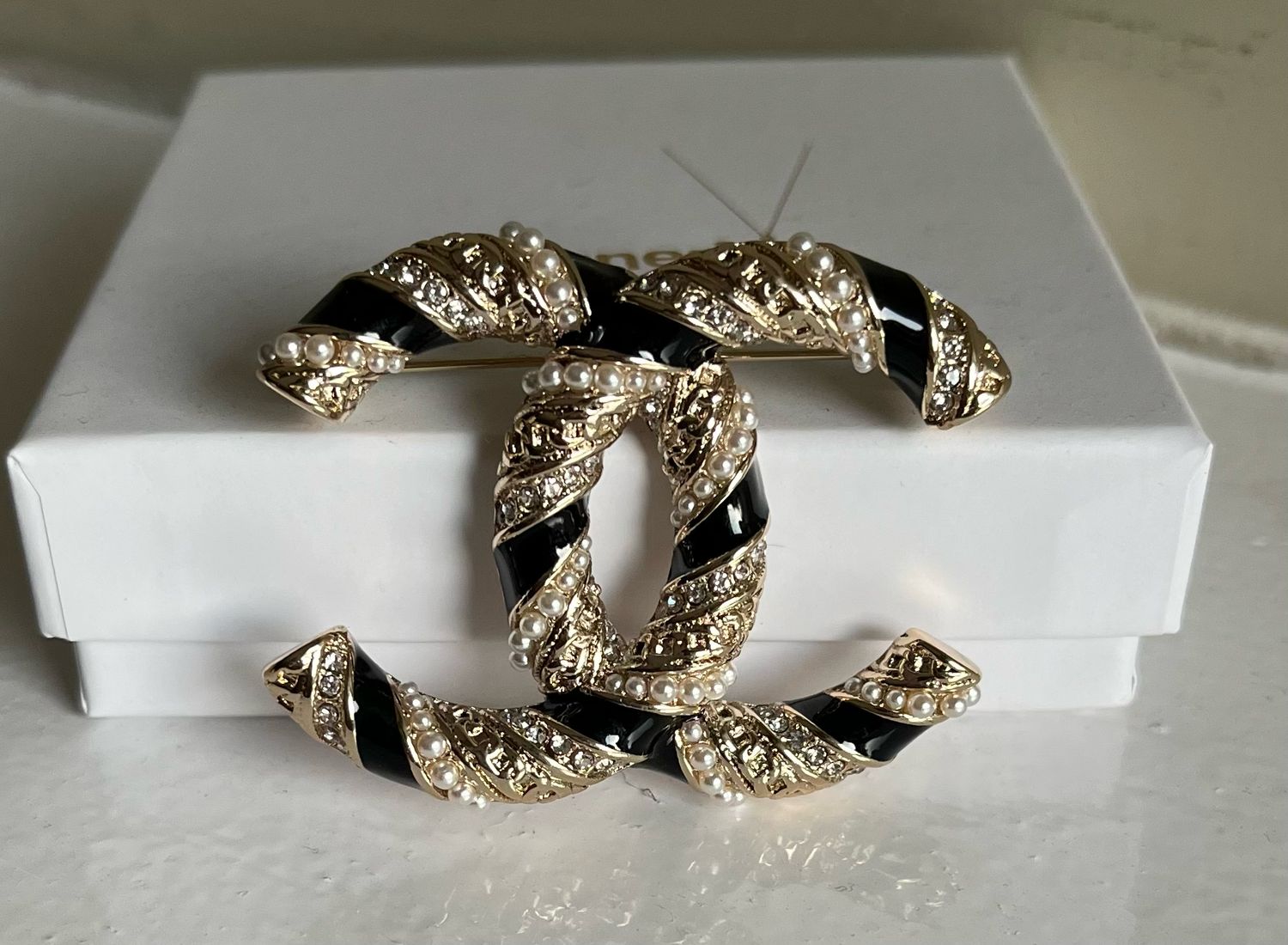 Designer’d CC Black & Gold Brooch