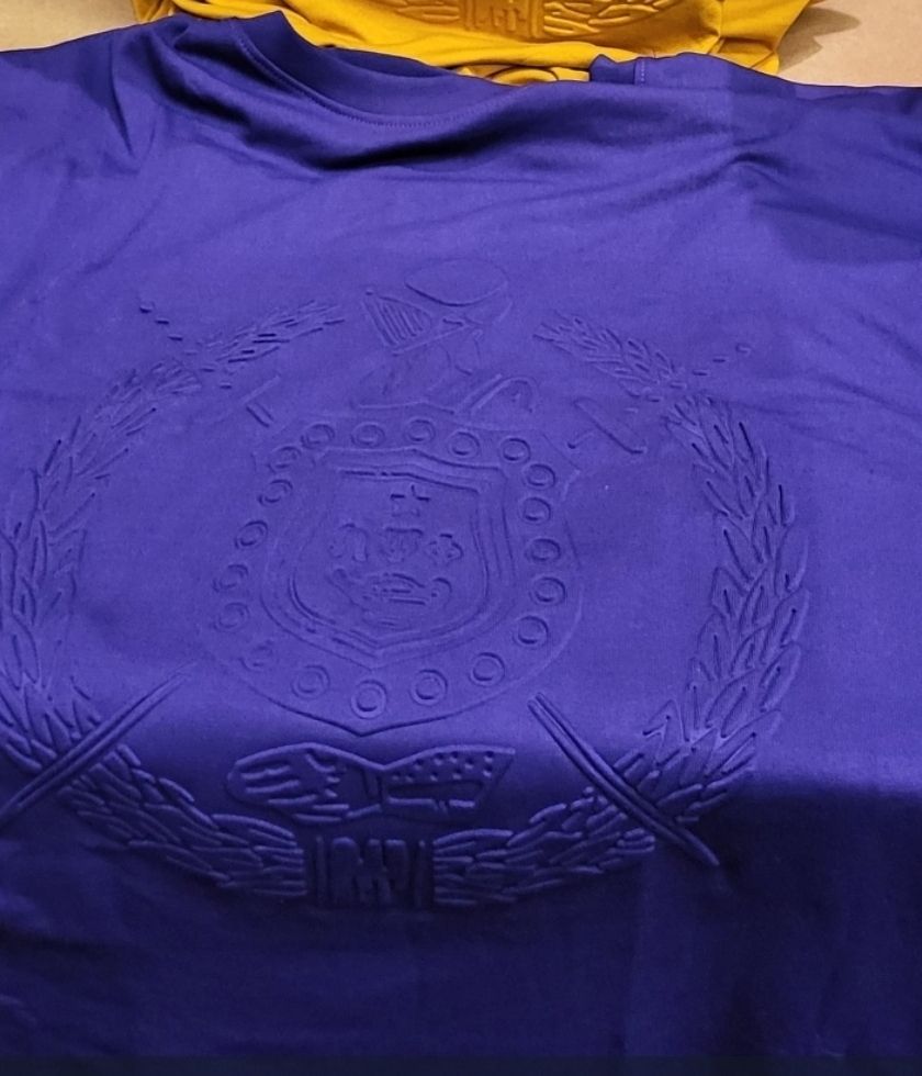 0mega Psi Phi Purple EMBOSSED Shield Shortsleeve
