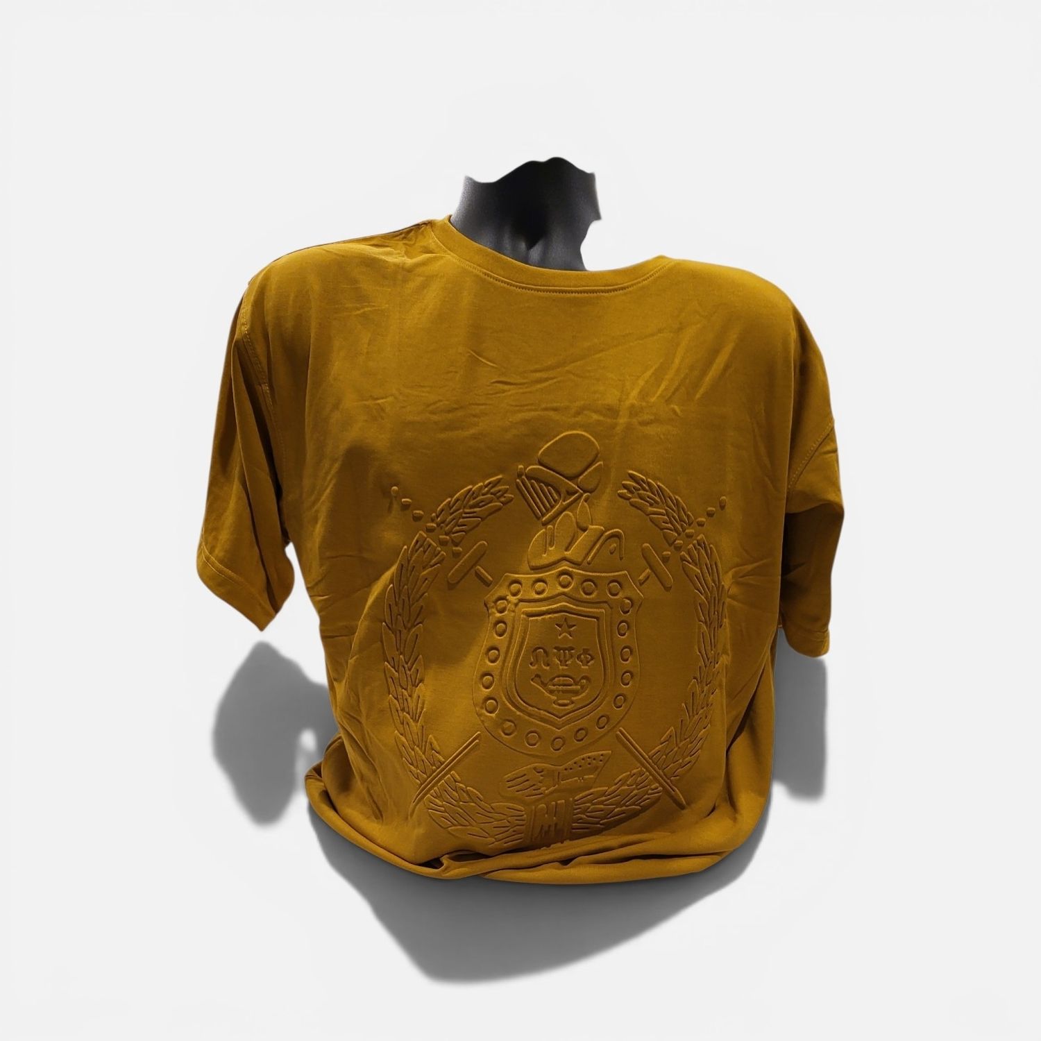 0mega Psi Phi Gold EMBOSSED Shield Shortsleeve