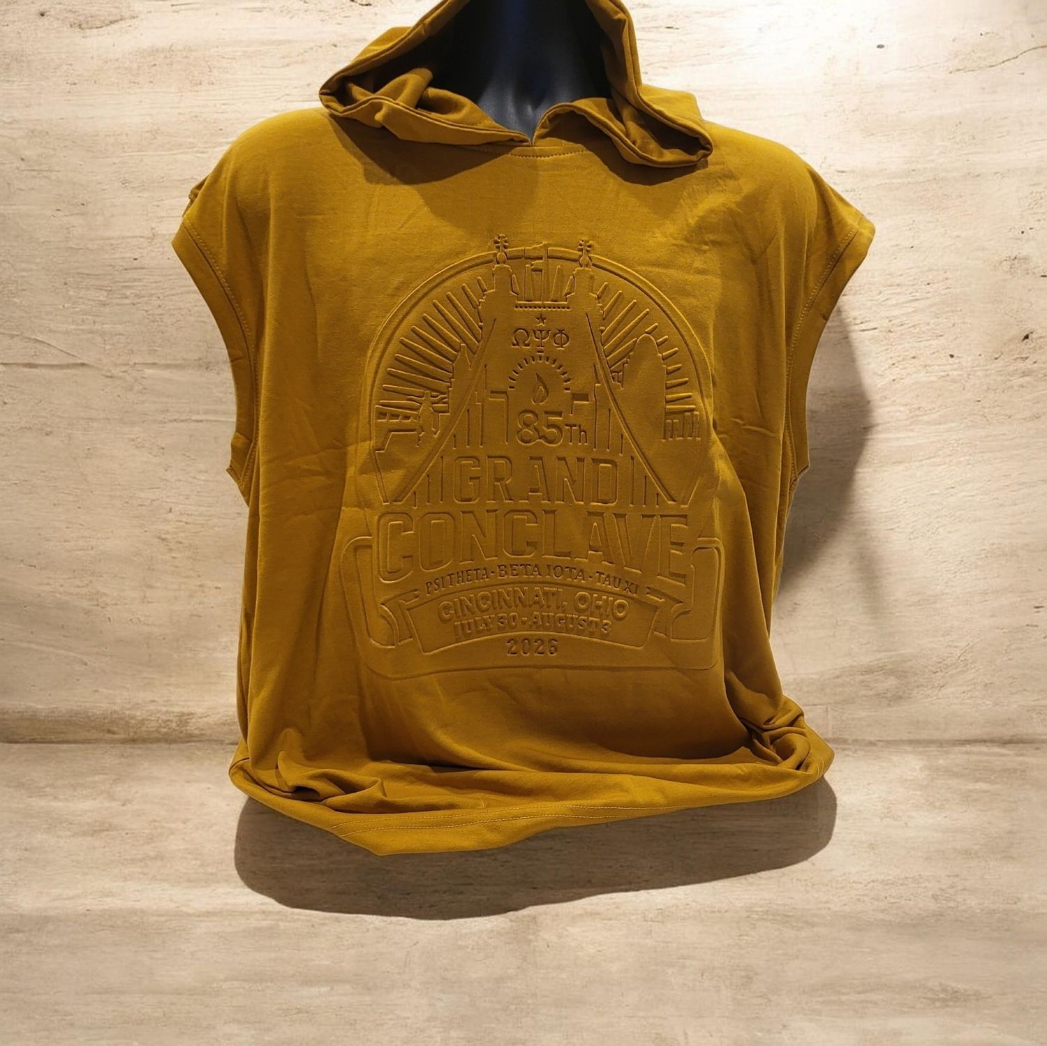 Omega Psi Phi 2026 EMBOSSED Gold sleeveless Conclave shirt